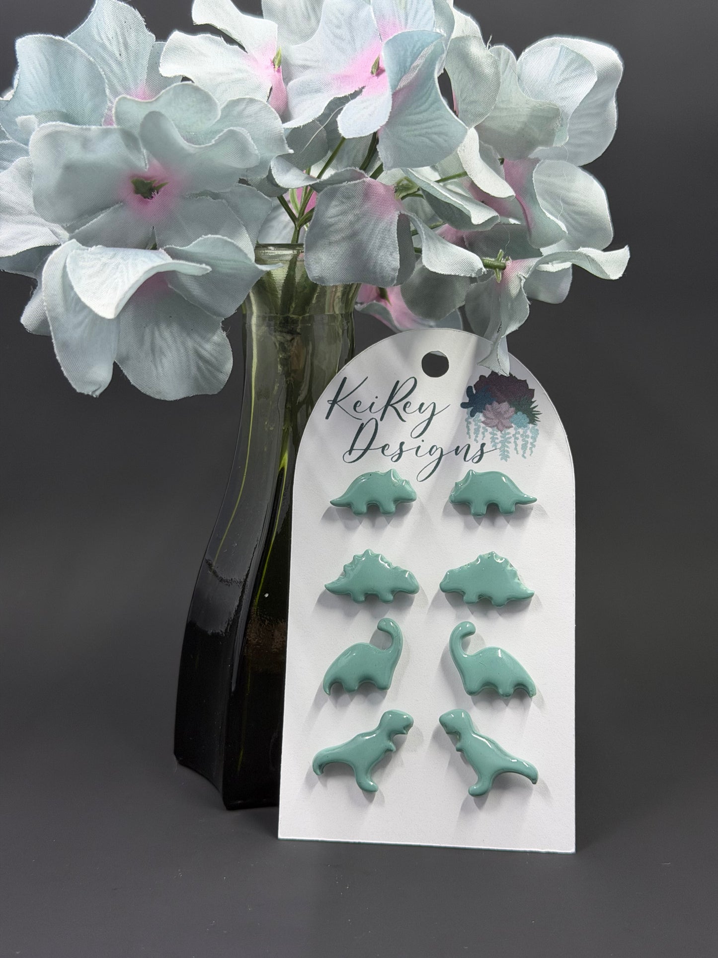 Dinosaur Stud Earring Set | Set of 4 Polymer Clay Earrings | Resin-Coated Dino Studs | Triceratops, Stegosaurus, Brontosaurus & T-Rex | Handmade Gift