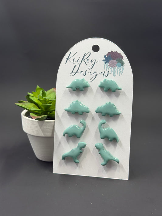 Dinosaur Stud Earring Set | Set of 4 Polymer Clay Earrings | Resin-Coated Dino Studs | Triceratops, Stegosaurus, Brontosaurus & T-Rex | Handmade Gift